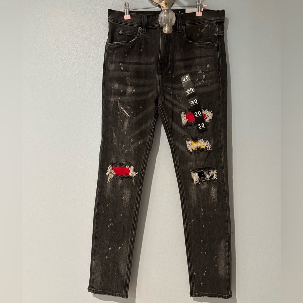 Distressed Black Jeans with Red and Yellow Accents